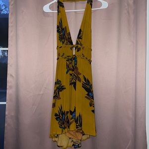 Mustard yellow floral halter dress with open back